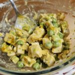 Bowl with curry chicken salad