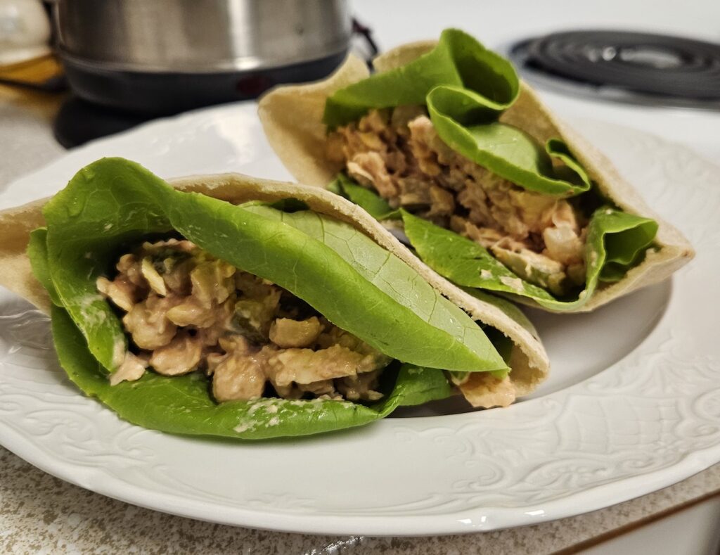 Using our plastic free ally the chickpea in a Chickpea salad with pita bread.