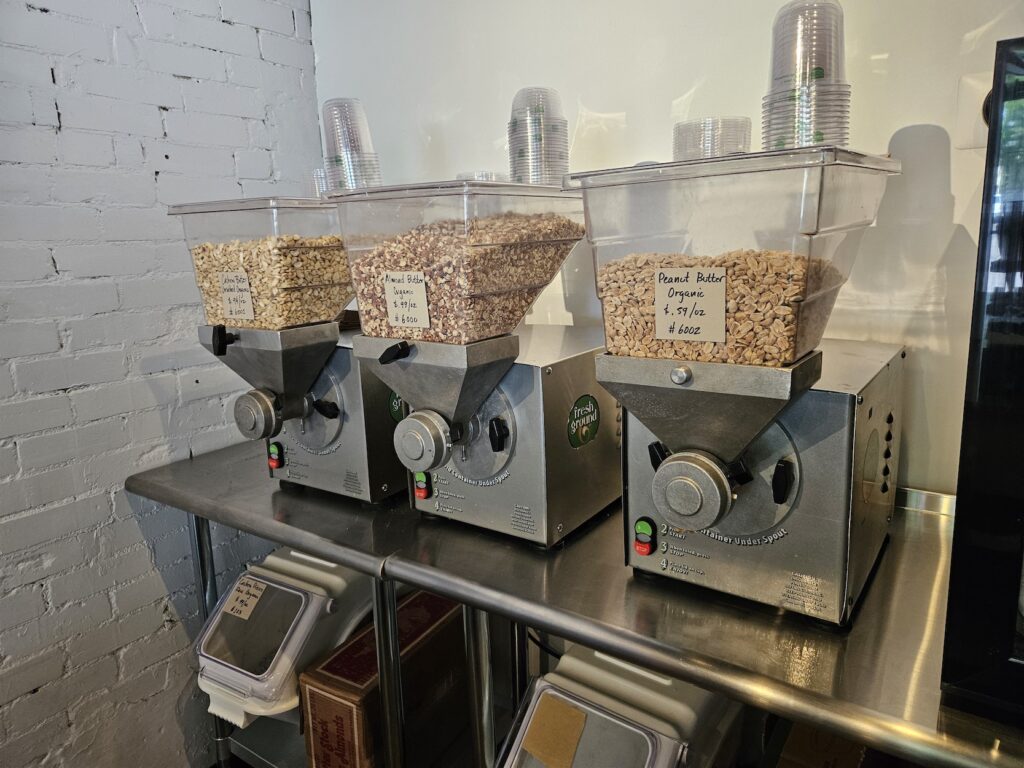 I was looking for zero-waste peanut butter and found these 3 nut grinding machines at the local bulk food store. 