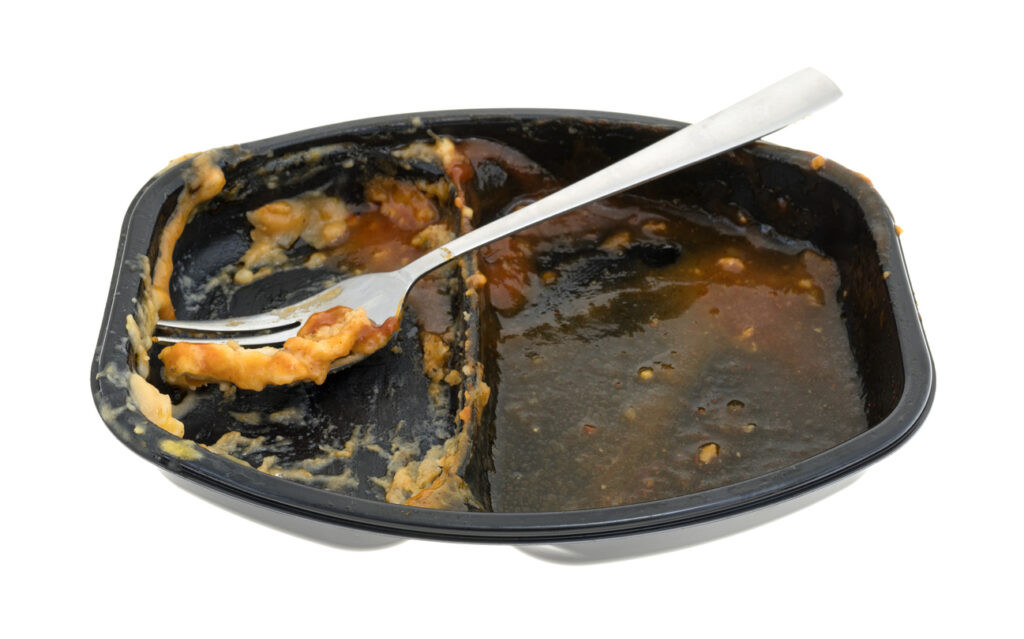 Empty TV dinner tray and fork