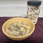 Butternut squash soup in bowl and jar